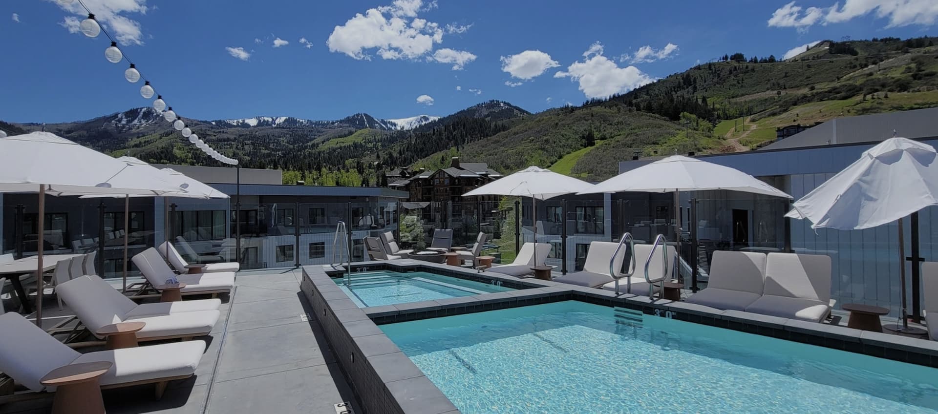 Rooftop pools with Wasatch mountain views at The Pendry, Park City